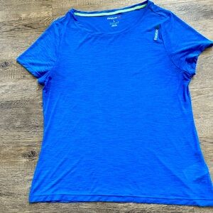 Reebok women active wear t shirt size L blue, semi sheer, soft , comfortable